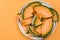 Sliced Cantaloupe Melon Served on Plate, Pastel Background , Border Background