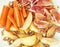 Sliced carrots, apple, grapefruit, oranges and walnuts, fruit th