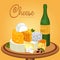 Sliced cheese pieces on plate and bottle of wine