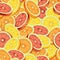 Sliced citrus fruits pattern of lime, orange and grapefruit