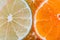 Sliced citrus: oranges, mandarines, lemons, limes, sweetie, grapefruits, witch\'s broom close-up macro