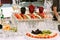 Sliced colorful fruits on the wedding table