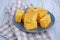 Sliced cornbread on a gray plate on a light wooden background. Corn flour recipes. C