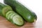 Sliced cucumbers on chopping board