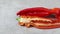 Sliced fresh red pointed bell pepper with seeds close up