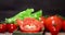 Sliced fresh tomato on the cutting Board rotates slowly.