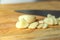 Sliced garlic on a cutting board with sunlight streaming in. These delicious smells make me think of cooking ideas and recipes tha