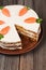 Sliced gourmet carrot sponge cake with icing cream