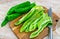 Sliced green peppers on board, food preparation