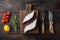 Sliced Halibut fish, with ingredients and rosemary herbs, on old dark  wooden table background, top view flat lay