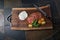 Sliced Heirloom Tomatoes and Mozzarella cheese on Cutting Board