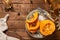 Sliced hokkaido pumpkin on a wooden board. Autumn cozy cooking concept