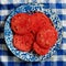 Sliced Homegrown Tomatoes on Blue Plate