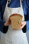 Sliced homemade bread in the hands of a baker