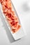 Sliced Jamon Iberico, Prosciutto or Speck on Restaurant Plate Isolated