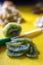 sliced kiwi. preparation of fruit for crepes. yellow cutting board