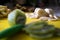 sliced kiwi. preparation of fruit for crepes. yellow cutting board