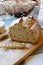 Sliced loaf of bread with seeds portrait crop