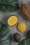 Sliced mango, coconut and ripe avocado fruits on marble surface