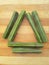Sliced moringa oleifera triangle on wooden background