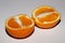 Sliced orange in two halves. Photo for design