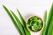 Sliced pandan leaf in a bowl on white background