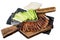 Sliced Peking Duck served with cucumber, green onion, and wheaten chinese pancakes on a meat cleaver Isolated, white