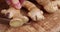 Sliced pieces of ginger root on the table