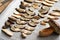 Sliced pine boletes on a table - wild edible mushrooms