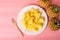 Sliced pineapple fruit on white plate with fork ready to eating