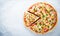 Sliced pizza with mozzarella cheese, chicken, sweet corn, sweet pepper and parsley on white background top view