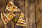 Sliced pizza on a wooden table close-up several pieces