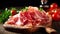 Sliced Prosciutto an Italian cold cut on wooden board