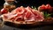 Sliced Prosciutto an Italian cold cut on wooden board