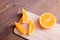 Sliced ripe appetizing delicious orange brown table