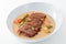 Sliced roasted duck in thai red curry ,Gaeng Ped Yang, with white background