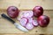 Sliced rustic red onions, vegetarian cooking ingredients