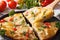 Sliced Spanish omelette with fried potatoes. Horizontal closeup