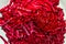 Sliced straw bright red beets. Background of sliced red beets.