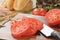 Sliced tomato and sandwich fixings