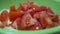 Sliced tomatoes in slices, close-up. The concept of vegetarianism. Video for cooking, for cooks, for healthy eating