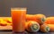 Sliced tubers and carrot juice Daucus carota on neutral background