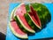 Sliced watermelon on a cutting board