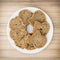 Sliced wheaten bread in circle shape on the white plate