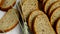 Sliced whole grain bread on table with a tablecloth, ears lie close to, healthy eating, health day