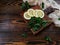 sliced and whole lemon on wooden chopping Board