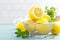 Sliced and whole lemons with mint