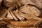 Sliced wholegrain sourdough  bread on wooden board