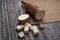 Sliced yucca root on a sackcloth on a black wooden table