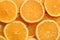 Slices of delicious oranges as background, closeup